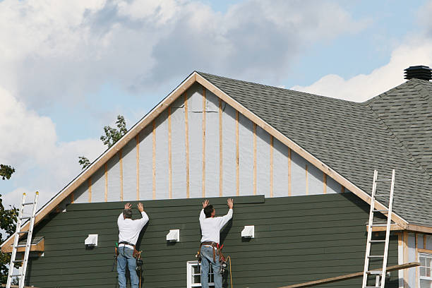 Professional Siding Repair technician working in White Cottage, OH